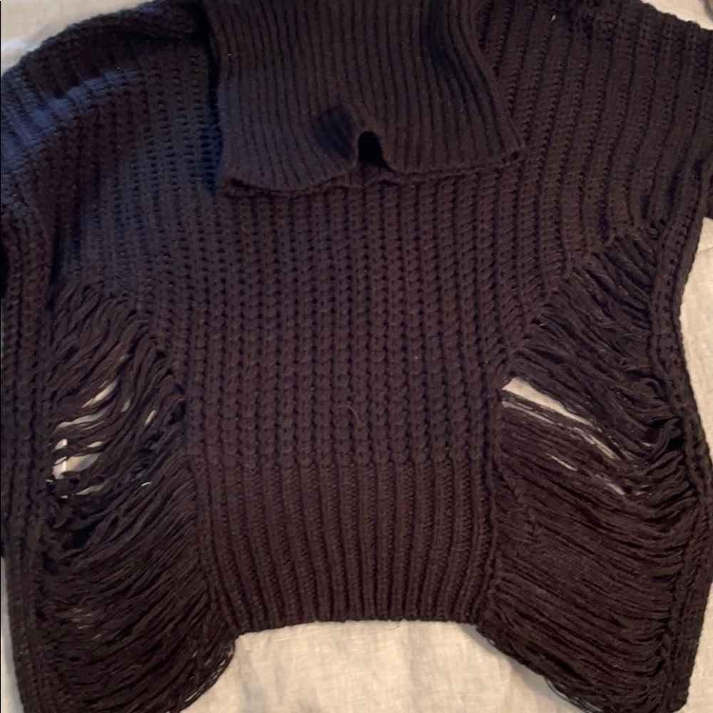 Black turtleneck with openings on side